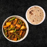 Chapati & Soulful Veggie Curry (Vegan) · Whole wheat flat bread baked to perfection over a pan. Comes with the side of fresh seasonal...
