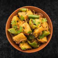 Potato Green Peppers Masala(Vegan)  · Diced potatoes, green bell peppers sautÃ©ed with a spicy masala sauce, served with a side of...