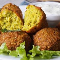 Falafel (5 Pcs) · Chickpeas, celery, parsley, lettuce, cumin, black pepper and salt served with white sauce or...