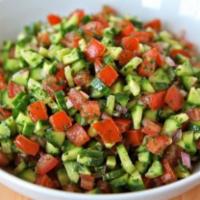 Shepherd Salad (Çoban) · Finely chopped tomatoes, cucumbers, onions and parsley.