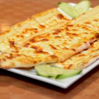 Kashkaval Pide (Mozzarella) · Thick dough crust topped w/ mozzarella cheese