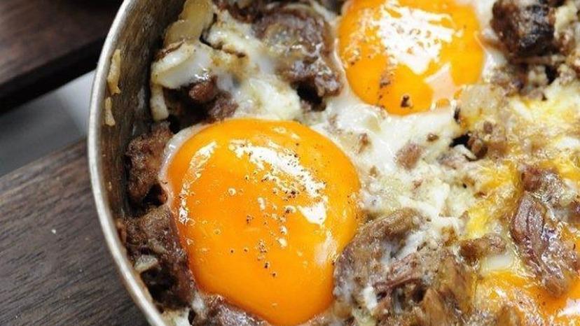 Kavurma On Eggs · Braised leamb with eggs.
Served with Turkish bread.