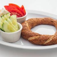 Simit Plate · Tomatoes, cucumbers, sheep cheese, mixed olives and mozzarella cheese.