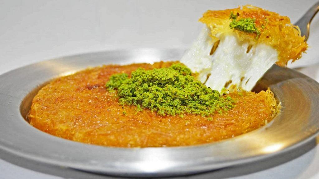 Kunefe · Made with cheese and shredded Kadayif noodles soaked in sweet syrup.