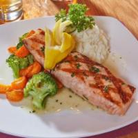 Grilled Norwegian Salmon Filet · char grilled to order salmon filet served with a pinot grigio, lemon & herb sauce and served...