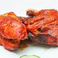 Chicken Tandoori · Recommended. Chicken marinated in herbs, spice, and BBQ over charcoal. Served with basmati r...