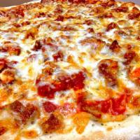 Chicken Parm Pizza (1/2) · Chunks of chicken cutlet, marinara, mozzarella and parmesan cheese on half the pie