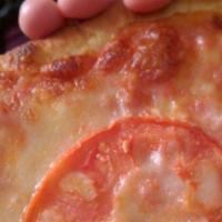 Grandma · Thin crust square pizza with fresh plum tomato sauce, layered with fresh mozzarella and whol...