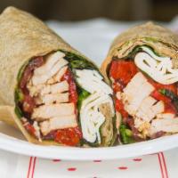 “Chicken Tuscany” · Grilled chicken breast, fresh Mozzarella, red peppers, lettuce, tomato, and balsamic dressing.