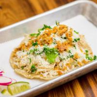 Taco · Fresh corn tortilla, meat or vegetable of your choice, salsa, onion, cilantro, crema, and Co...