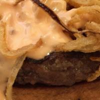 Grilled Cheese Stack Burger · Grilled cheese on white bread, topped with burger patty, fried onion straws and russian dres...