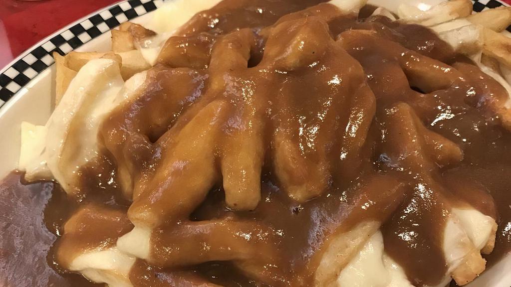 Disco Fries · Layered with mozzarella cheese and brown gravy.