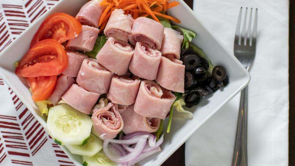 Antipasto Salad · Mixed greens with ham, salami, capicola, and provolone.
