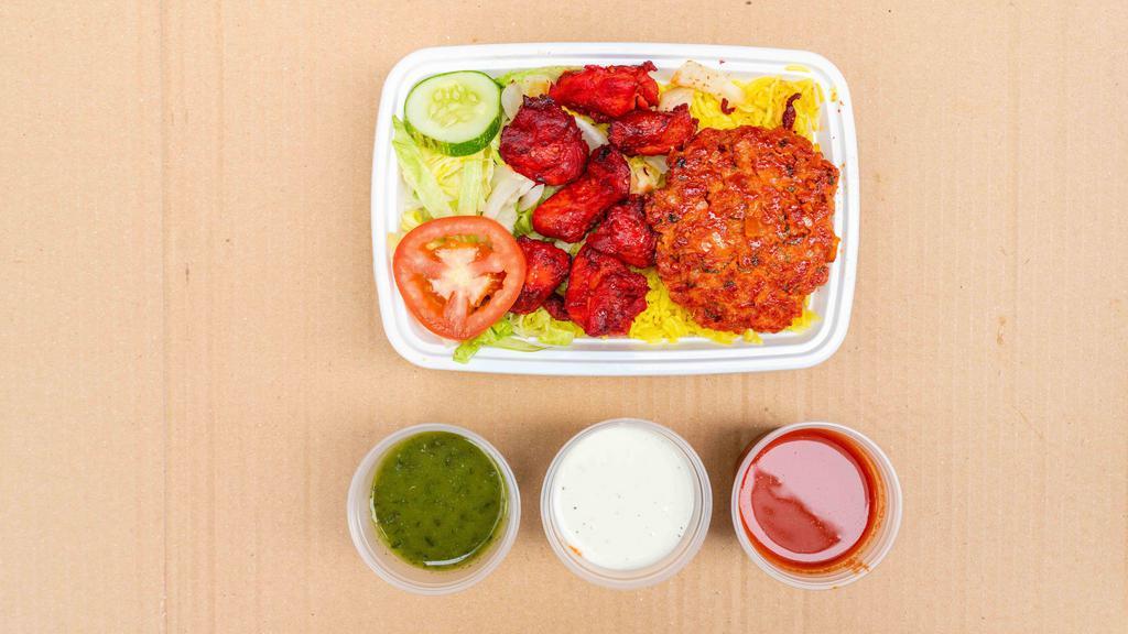 Combo Kebab W/ Rice · Comes with salad and sauce.