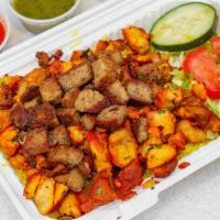 Chicken & Lamb Mix Over Rice · Comes with salad and sauce