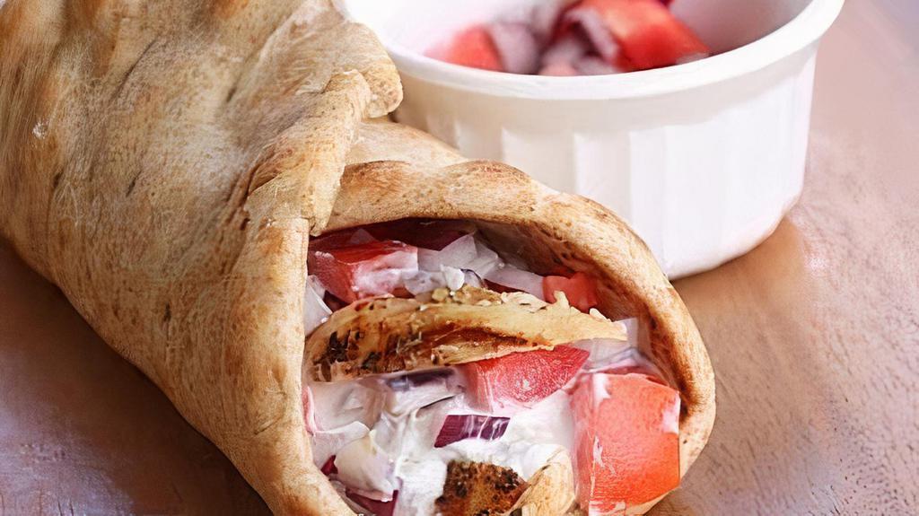 Chicken Gyro · Comes in pita bread with salad and sauce.