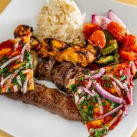 Mixed Grill · Grilled chicken, Filet Mignon and Kefta Skewers.
Served with grilled vegetables, rice and ga...
