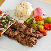 Kefta · Grilled ground lamb mixed with chopped onions, parsley and spices.
Served with grilled veget...