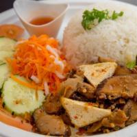 Vegan Rice Plate · Sautéed shitake and wood ear mushrooms and slices of fried tofu with peanut sauce instead of...