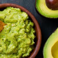 Guacamole · Creamy Mexican avocados mashed with a touch of lime juice. Vegetarian. Gluten free.