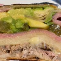 W Cubano · Thinly sliced roasted pork, sliced deli ham, provolone cheese, mustard, pickles & sliced avo...
