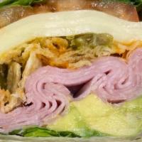W Ham/Turkey Club · Your choice of sliced deli ham or turkey, provolone cheese, tortilla strips, green leaf lett...
