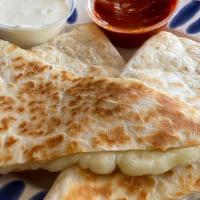 Cheese Quesadillas · Tasty melted mozzarella cheese. Paired with a side of crema & jalapeno lime sauce. Vegetarian.
