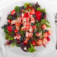 Berry & Goat Cheese Salad · Mesclun lettuce, fresh roasted turkey, goat cheese, strawberries, blueberries, and walnuts. ...