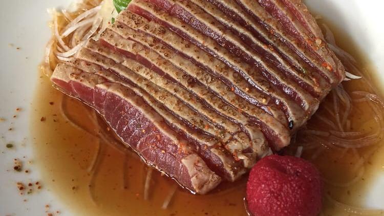 Tuna Tataki · Thinly sliced seared tuna with ponzu sauce.