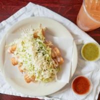Flautas · Crispy tacos rolled up and stuffed with your choice of meat topped with lettuce,tomatoes, ch...