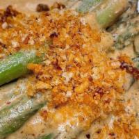 Asparagus · Hazelnut vinaigrette, crushed red pepper, crumbs
