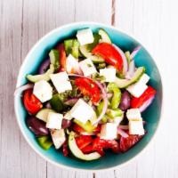 Greek Salad · Fresh salad with romaine lettuce, cherry tomatoes, cucumbers, peppers, red onions, feta chee...