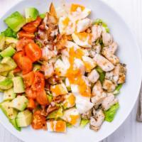 Cobb Salad · Fresh salad made with mixed greens, grilled chicken, carrots, mushrooms, tomatoes, and avoca...