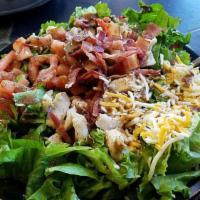 Mike & Jay'S Salad · Romaine lettuce tossed with grilled chicken, broccoli, bacon and tomato with a creamy honey ...