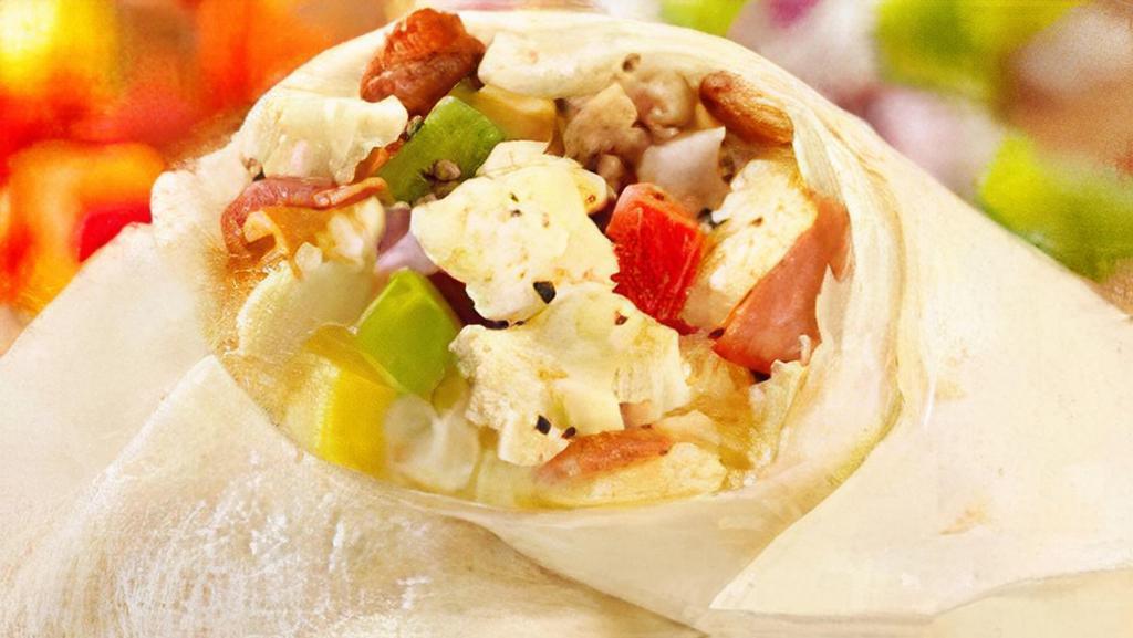 Pepper & Egg Breakfast Burrito · Scrambled eggs, sauteed green peppers, onions, breakfast potatoes, and choice of cheese wrapped in a flour tortilla.