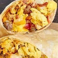 Meat Lover’S Breakfast Burrito · scrambled eggs, bacon, sausage, ham, mushroom, breakfast potatoes, and choice of cheese wrap...