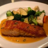 Broiled Salmon · With white wine and lemon sauce.