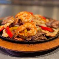Fajitas · Sautéed with mixed bell peppers, mushrooms, and onions.