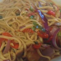 Tallarin Saltado De Carne · Spaghettis Stir-Fried Beef tenderloin with onions tomatoes and green onions