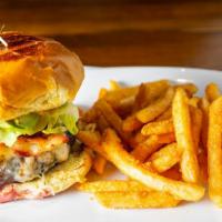 California Burger · A juicy all-beef patty smothered with melted mozzarella cheese. Topped with avocado, bacon, ...