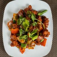 Chilli Chicken Dry · Boneless chicken marinated with ginger & garlic paste, sauteed with fresh green onions and b...