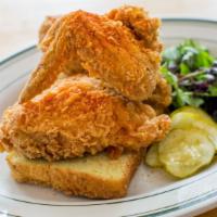 Fried Chicken · Crispy fried chicken prepared in your choice of spice level with your choice of side.