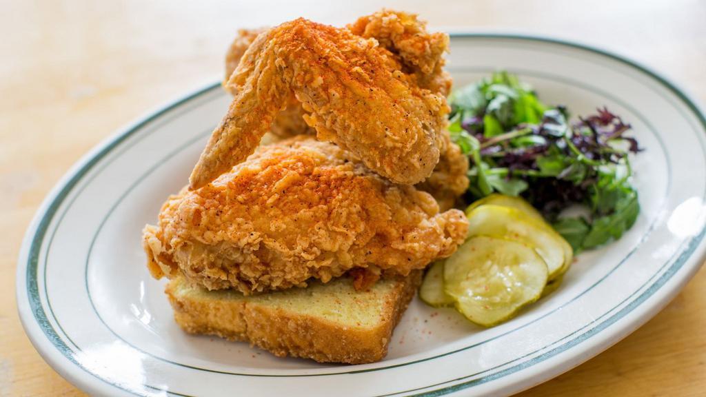 Fried Chicken · Crispy fried chicken prepared in your choice of spice level with your choice of side.