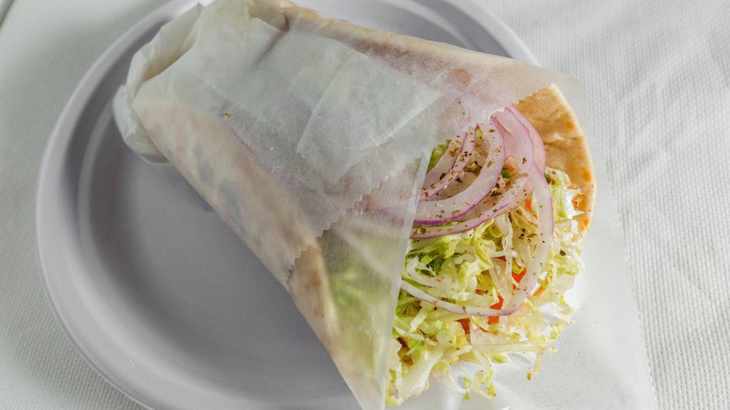 Chicken Souvlaki In Pita · Grilled chicken breast with tzatziki sauce, lettuce, tomato & onions. Only comes on pita.