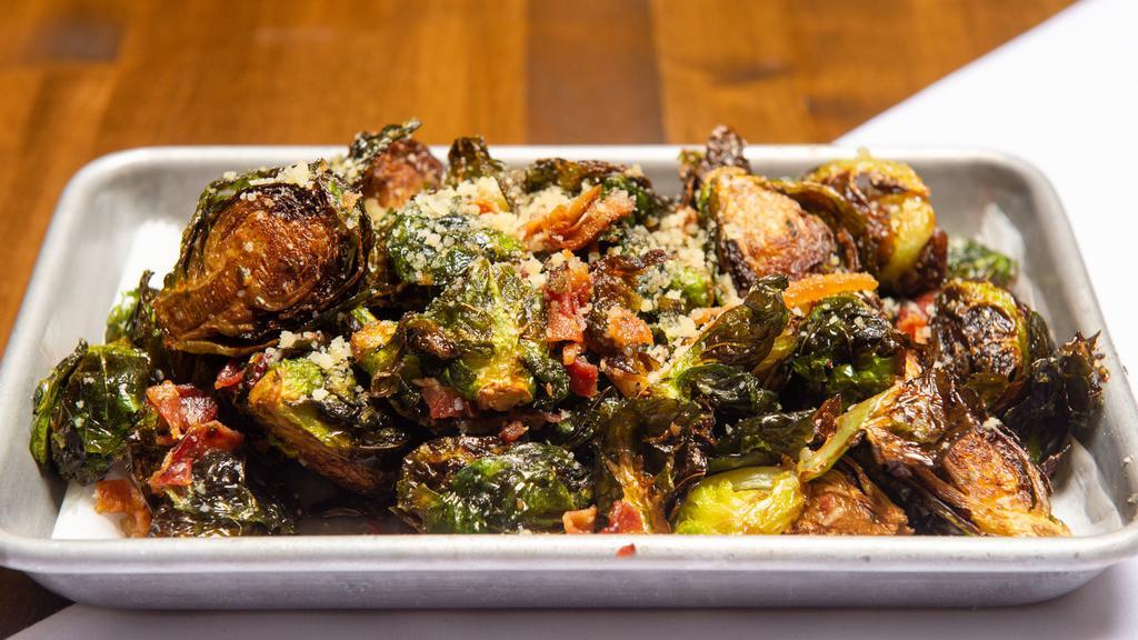 Brussel Sprouts · sprouts flashed fried and tossed with bacon and parmesan cheese