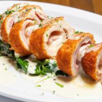 Chicken Cordon Bleu · chicken breast wrapped around mozzarella and ham, breaded and then deep-fried to perfection....