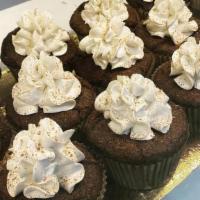 Mexican Hot Chocolate Cupcake · Delicious chocolate cupcake with a hint of spice and cinnamon topped with white chocolate bu...