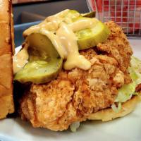 Southern Fried Chicken Sandwich · A huge piece of our famous buttermilk fried chicken with pickles, chipotle mayo & shredded l...