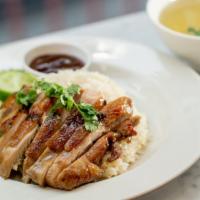 3  Roasted Chicken Rice  · Roasted chicken with ginger rice, served with House  sauce.and daikon soup