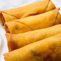 Spring Roll · Crispy veggie spring roll served with sweet chili sauce